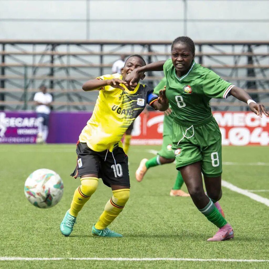 Uganda’s Teen Cranes and Kenya’s Harambee Junior Starlets players battle for possession during their CECAFA U-17 Women’s Championship semi-final clash at KMC Stadium, where Uganda secured a 3-0 victory to advance to the final. ASAL POST