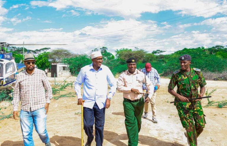 Photo Caption - Cabinet Secretary for Health Aden Bare Duale, accompanied by Garissa County CECM for Health and Garissa County Commissioner, arrives at Balambala Sub-County Hospital during an official visit to inspect the progress of the ongoing construction works.