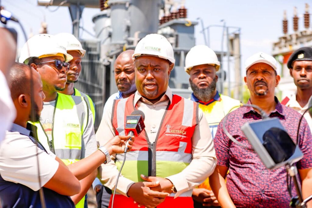 Energy Principal Secretary Alex Wachira and Garissa Township MP Hon. Dekow Mohamed during an inspection of the upgraded Garissa Kenya Power substation, where the installation of a new 23 MVA transformer is expected to enhance electricity reliability and end frequent power outages in the county. Photo: Handout | Asal Post.