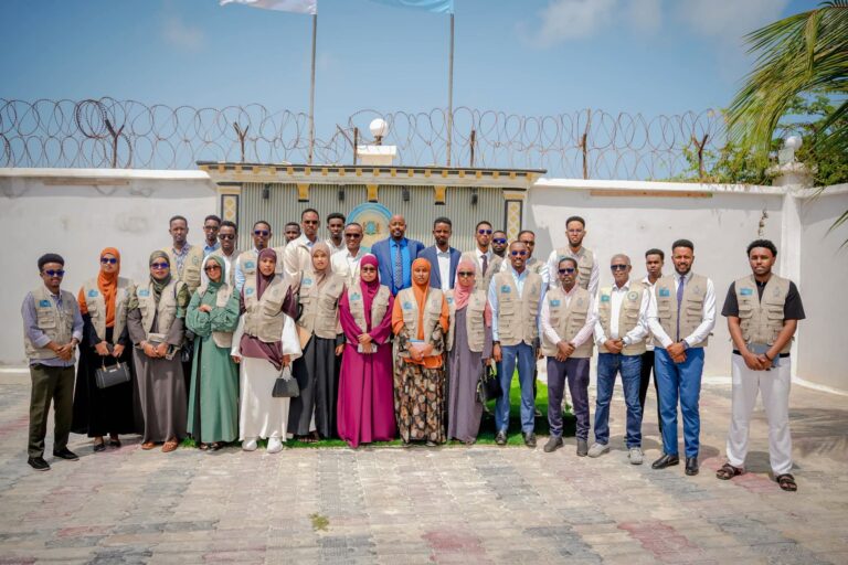 **Somalia’s disaster management officials pose for a group photo before travelling to China for training on flood prevention, preparedness, and response as part of efforts to strengthen national disaster management capacity. Photo: SoDMA. Photo (Handout)