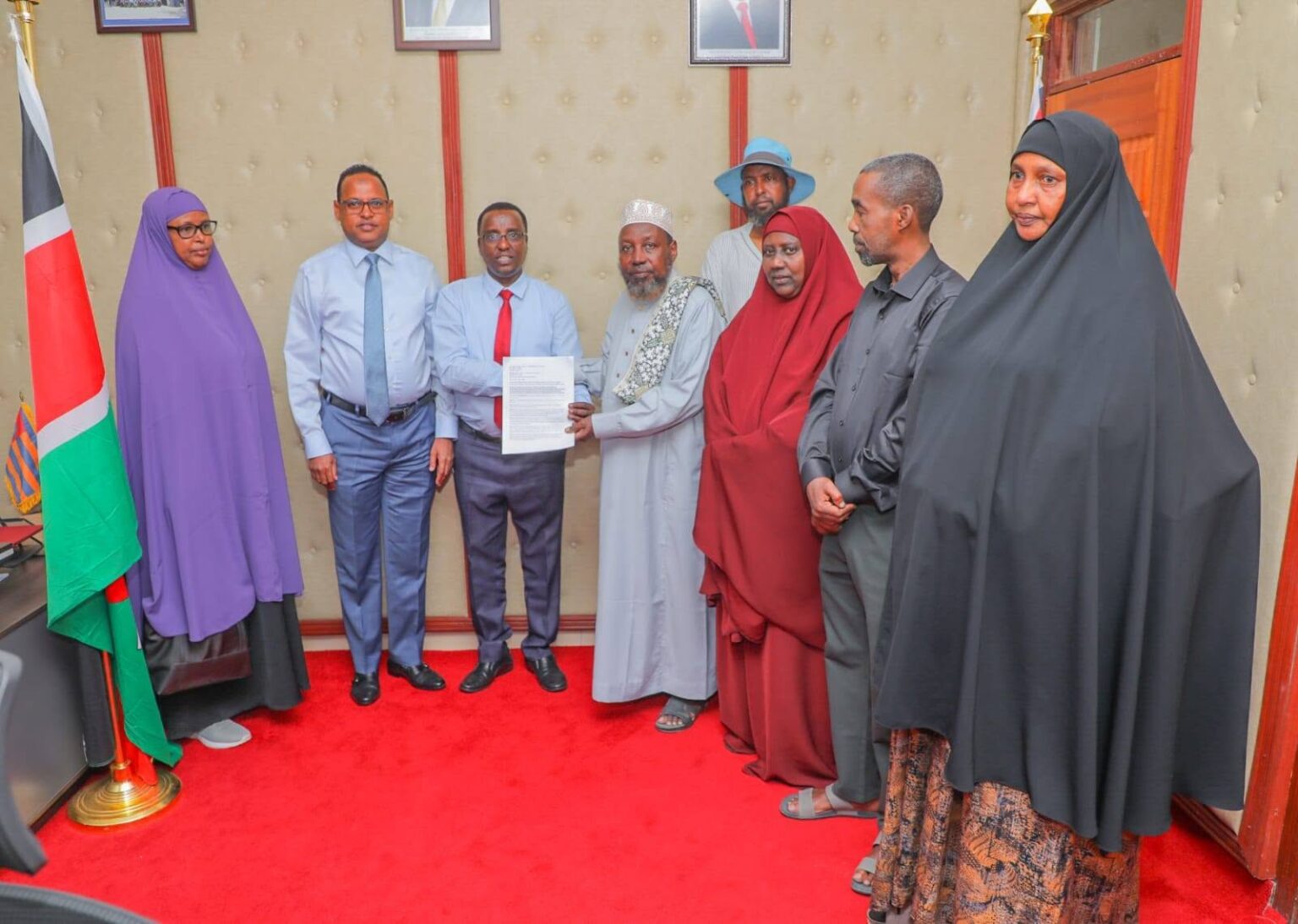 Garissa Farmers Network (GFN) Chairperson Abdullahi Abdi presents a petition to County Assembly Speaker Abdi Idle Gure, urging urgent action to address recurring floods and strengthen support for the county's agriculture sector. Deputy Speaker Mustafa Abdirashid (left) looks on.