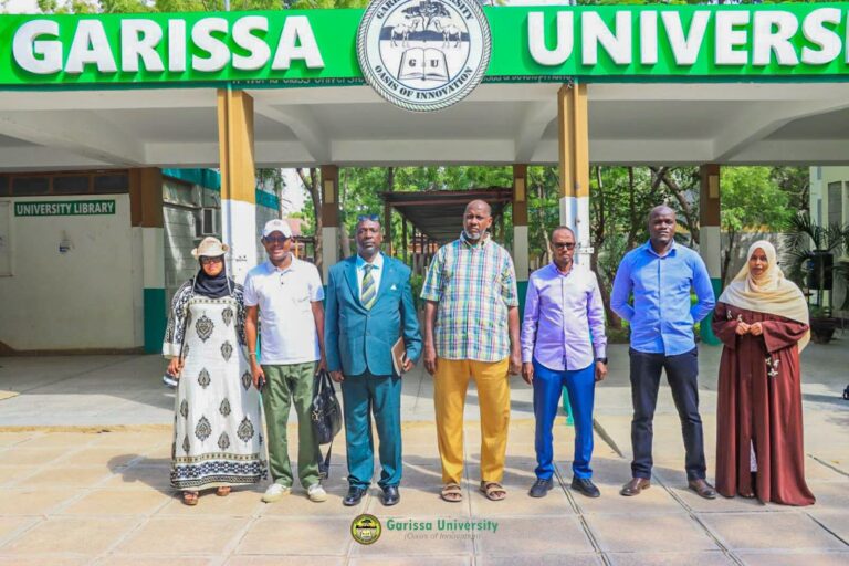 Officials from Garissa University and the Agricultural Development Corporation (ADC) pose for a group photo following a consultative meeting on a proposed Joint Venture Agreement and Memorandum of Understanding (MoU) aimed at strengthening agricultural research, innovation, practical training, and strategic collaboration. Photo/Garissa University